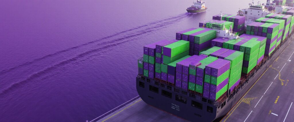 Realistic visual of global ocean freight logistics for CPG shipments, featuring smart containers on cargo ships with AI-powered real-time tracking across sea routes.