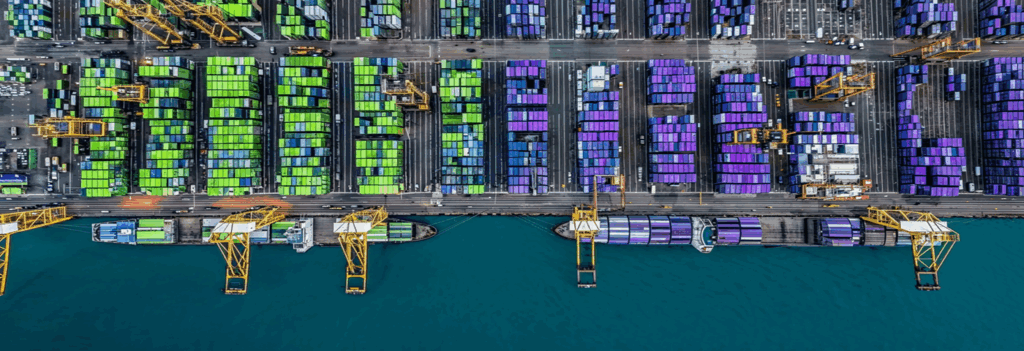 Realistic depiction of modern port operations in Saudi Arabia, featuring container terminals with AI-driven data overlays, smart cargo movement, and dynamic resource allocation.